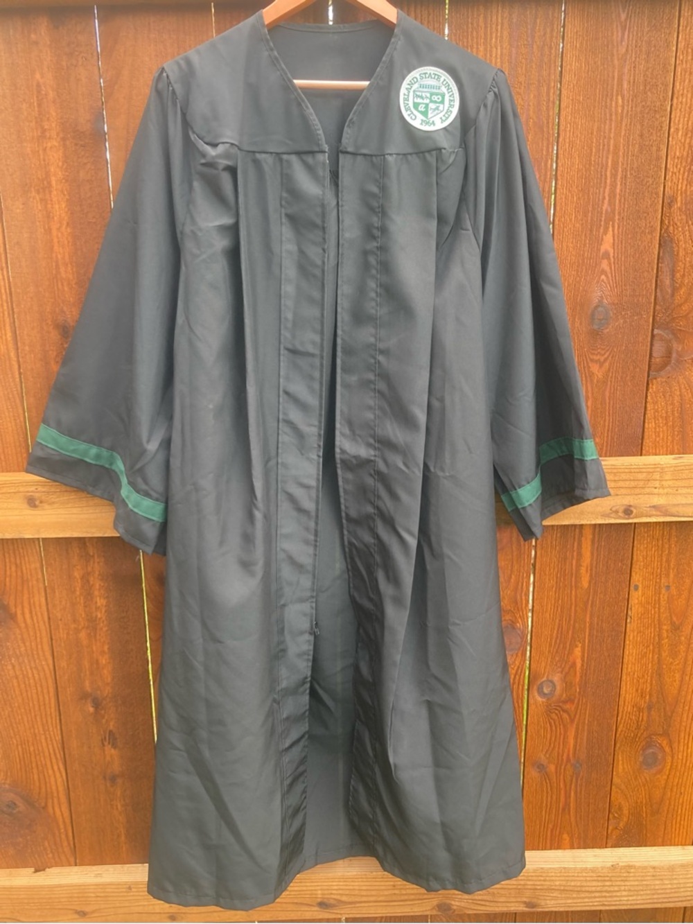 Cleveland State University Graduation Gown with Green Trim and Patch